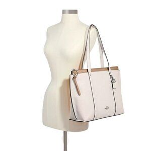 Coach cream and tan silver hardware and never used large structured satchel NWT